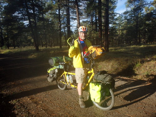 GDMBR: Dennis in shorts, gloves, and warm rain jacket.